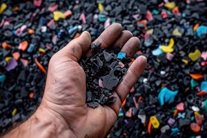 man hand holding plastic waste